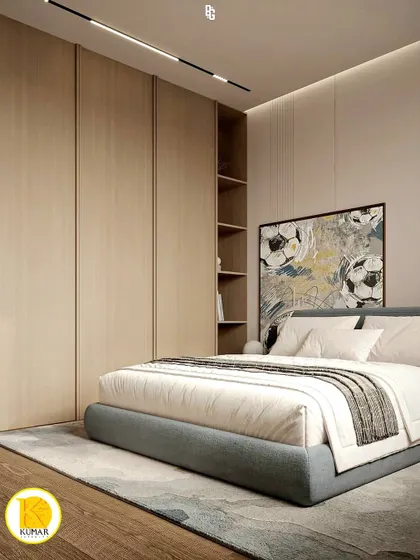 A minimalist bedroom with a low-profile bed and a large, abstract art piece.