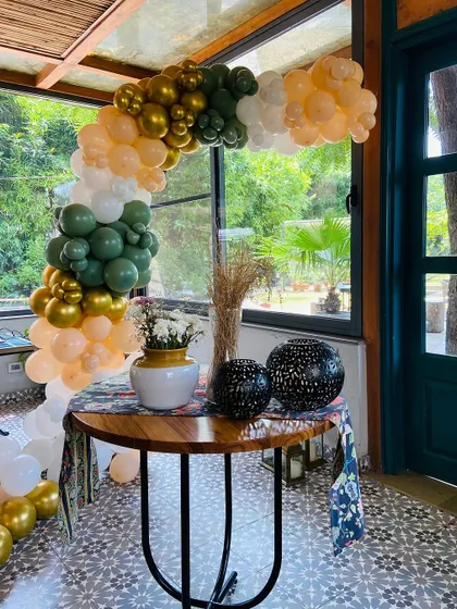 The colors of this balloon arch were chosen to complement the venue's decor.