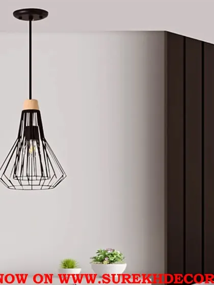 A stylish metal hanging light with a geometric cage design in an antique black finish. This fixture is perfect for showcasing a vintage-style Edison bulb and adds an industrial-chic touch to any space.