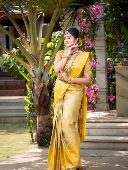 Another elegant pose from the photoshoot, highlighting the complete bridal look.