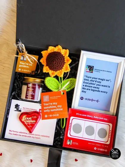 Our 'Tunes of Love' hamper combines multiple personalized elements, including a custom Spotify song frame and song-themed tags.