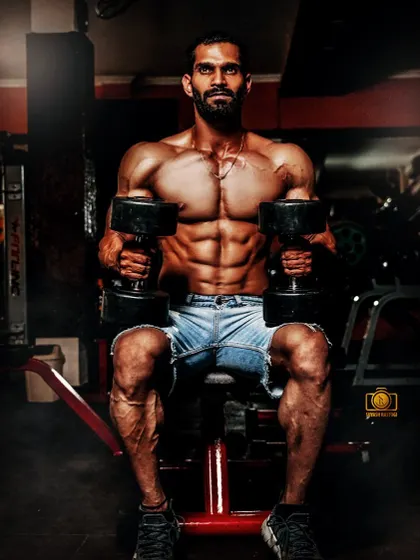 Overthinking will destroy you. Stay focused, stay consistent. A shot from a professional photoshoot in the gym, showcasing a ripped physique.