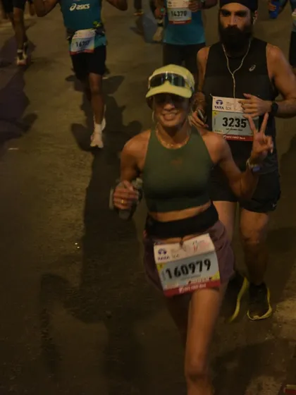 A happy moment during the Tata Mumbai Marathon. The support from the crowd and fellow runners makes this race an unforgettable experience.