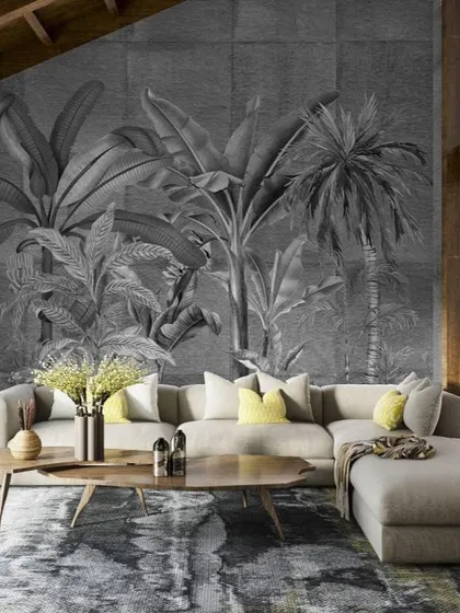 This monochrome tropical mural from the Prakriti collection adds a sophisticated, modern touch to this living space. The design is printed on a textured base, giving it depth and a rich, tactile feel.