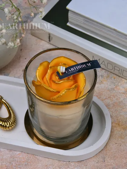 A sunny yellow rose votive candle to brighten any room. These candles are set on a Jesmonite tray I also make, creating a complete decor moment.