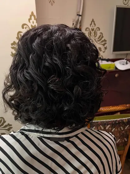 The back view of the curly bob, highlighting the defined curls and the clean silhouette.