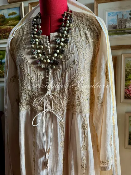 A close-up of the bodice, showing the intricate Kasab work and tie-up detail.