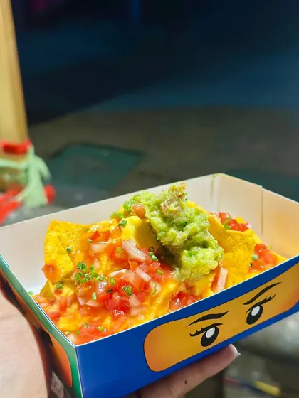 Loaded nachos in a custom LEGO Ninjago tray, a fun and delicious treat for Sharav's 6th birthday.