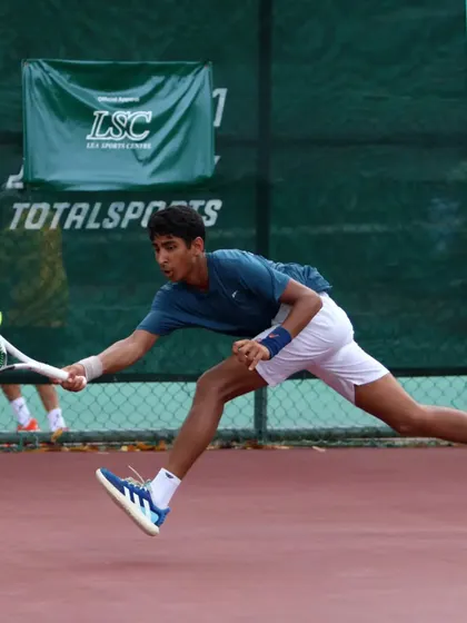 This is what high-stakes competition looks like. One of my top athletes, Tavish Pahwa, is captured here in full flight during a match at the World U14 Asia Oceania competition. My training develops the dynamic movement and technical precision required to excel on the world stage.