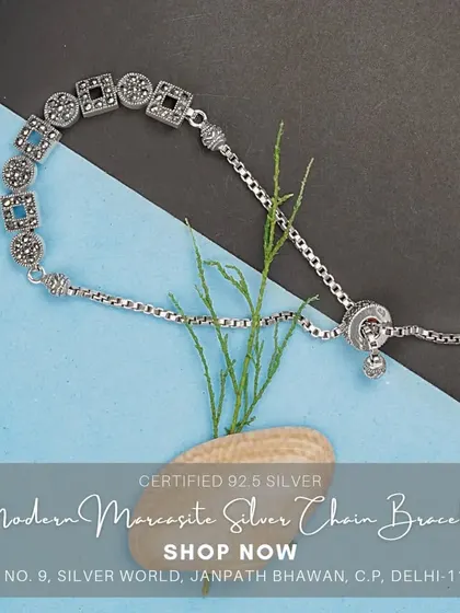 A modern bracelet with square and round motifs set with fine quality Swiss marcasites. The adjustable chain ensures a perfect fit.