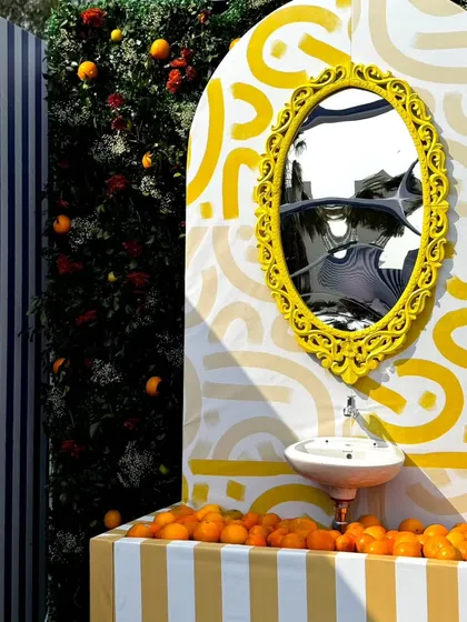 From concept to execution in just 42 hours. This St. Tropez inspired decor in Ahmedabad involved transforming a bungalow with custom-painted walls, fruit-based installations, and unique props, all on a tight deadline.