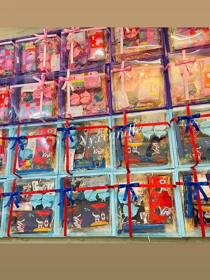 Another shot of the combined Unicorn and Space themed birthday order, showing how we use different colored boxes and ribbons to distinguish the themes.
