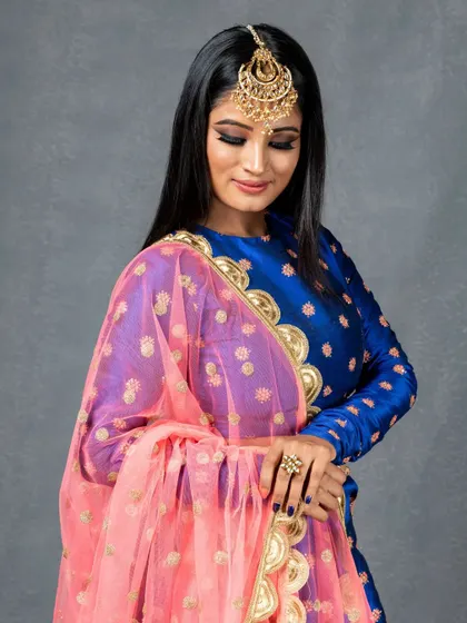 A side profile showcasing the contouring and the way the smokey eye enhances her features. The jewellery, a stunning passa, is also from my collection.