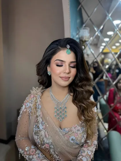Another shot of Soumya's makeup, with her eyes closed to show the beautiful blend of the pink eyeshadow.