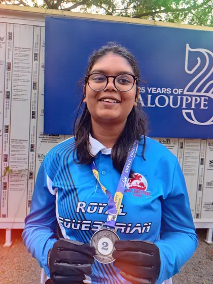 A close-up of Priya with her silver medal from the Japalouppe games. Her belief that anything is possible is an inspiration to everyone at the academy.