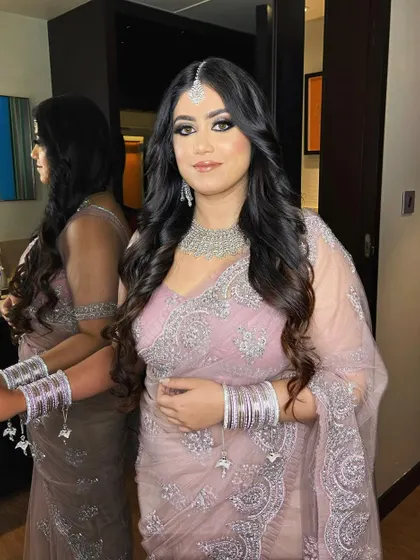 A full view of this engagement bride's look. The smokey eye and soft waves create a glamorous and modern feel.