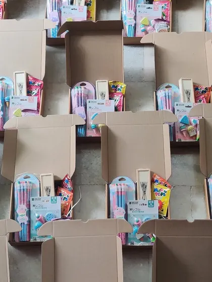 Here's a bulk order of 25 custom kids' hampers being prepared. I can handle orders of any size for birthday return gifts, ensuring each one is packed with care.