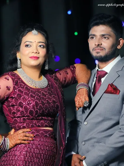 A stylish couple portrait from a reception. We work with our clients to create poses that feel natural and reflect their personalities, resulting in confident and beautiful photos.