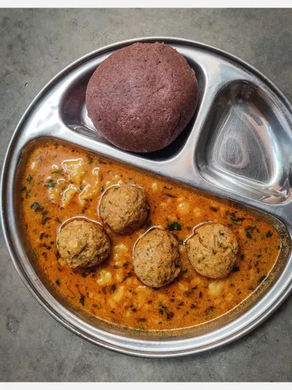 This is the heart of my cuisine: Khaima Unde Saaru with Ragi Mudde. The curry is made with hand-minced Bannur lamb meatballs in an earthy, flavourful gravy, a perfect and traditional pairing for the wholesome ragi ball.