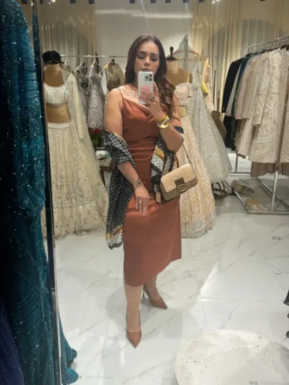Another look at my Pantone-inspired outfit. The right accessories, like this Fendi bag and classic pumps, complete the look and add a touch of luxury.