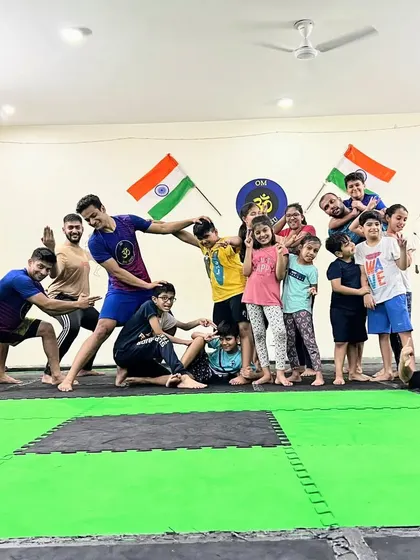 Keeping it playful, keeping it real. This photo perfectly captures the fun, chaotic, and supportive energy of our mixed kids and adults class.