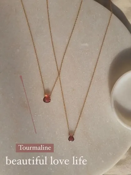 For a beautiful love life, I recommend Pink Tourmaline. This is my 'ṣatra' heart-shaped drop pendant, a stone of love, compassion, and emotional healing that also encourages self-love.