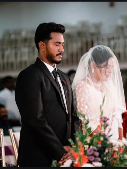 A solemn moment during a Christian wedding ceremony. We respectfully capture the prayers and vows that are central to your commitment.