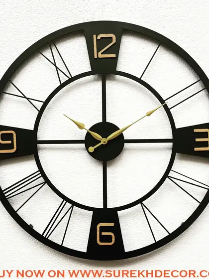A bold take on the vintage clock, this piece features prominent Arabic and Roman numerals in a striking design. The black metal frame with gold-finished numbers creates a powerful visual contrast.