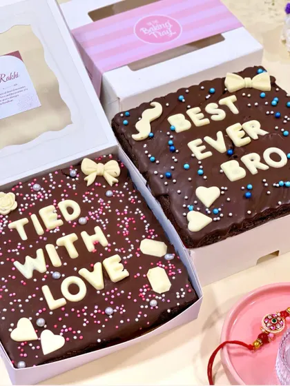 Say it with brownies. My customizable brownie tiles are perfect for Rakhi, letting you add a personal message like "Best Ever Bro" or "Tied With Love" on a delicious, fudgy, and eggless chocolate base.