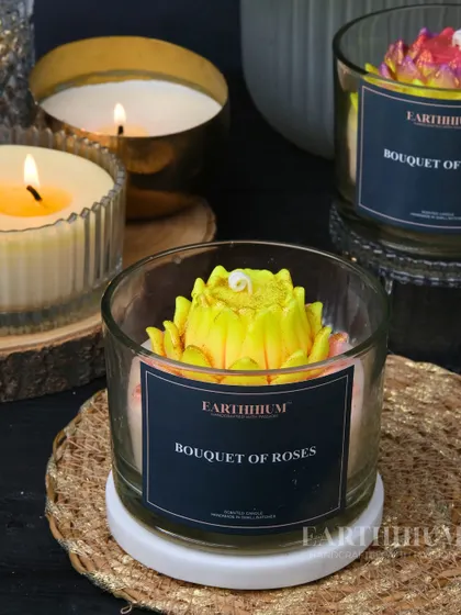 This 'Bouquet of Roses' candle features a unique floral sculpture on top. It's crafted to uplift your mood and fill your space with a lovely fragrance.
