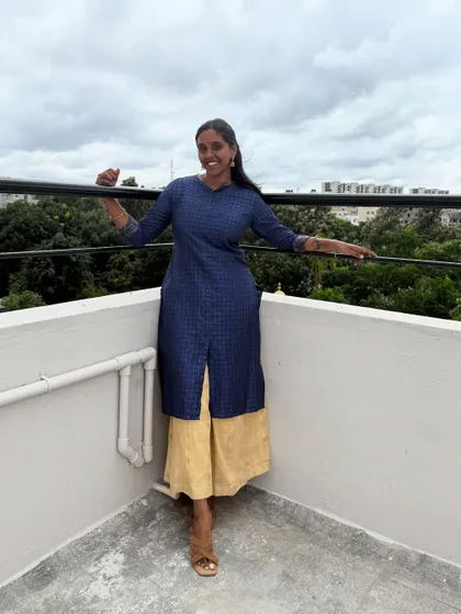 Posing on a balcony with a lovely view. A simple, happy picture from my daily life.