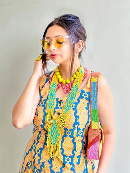 A final candid shot of my dopamine-filled outfit. The accessories truly make the look.