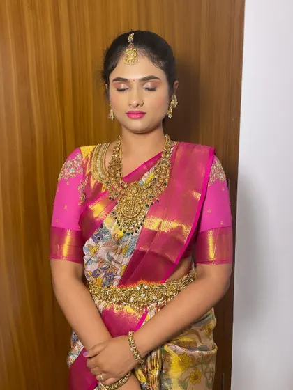 A duplicate of 80, showing the full bridal look.