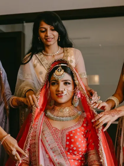 The final look, with the dupatta perfectly placed. This bride is the picture of grace and elegance, ready for her big day.
