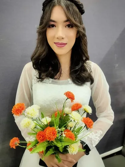 The final look of a Christian bride, ready for her wedding day. Our students build a portfolio with diverse looks like this.
