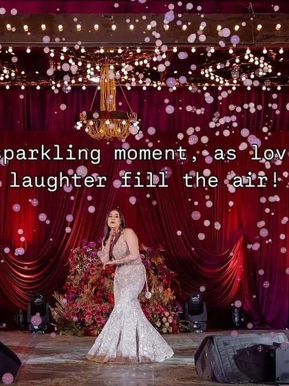 A sparkling moment for a sparkling bride. We used a bubble machine and dramatic lighting to create this beautiful, celebratory shot during the bride's solo performance.