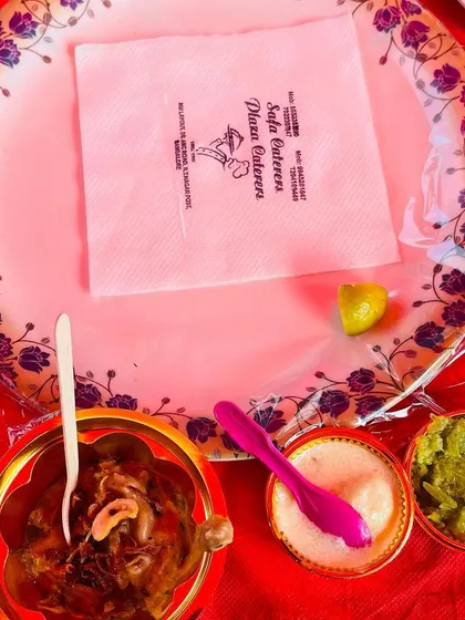 A complete dessert setting. This includes our gajar ka halwa, phirni, and a rich, dark sweet, all served with our custom branded napkin.