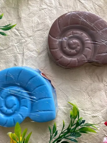 A pair of my seashell soaps. The swirled design is so fun to make, and kids love discovering them in their bath.