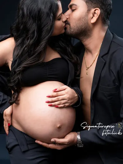 This is the same passionate and stylish shot, perfect for couples who want a bold and memorable maternity photo.