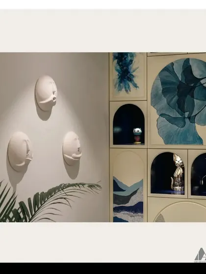 A diptych showing the final installed artwork alongside curated wall sculptures. This highlights how we layer different art forms to create a rich, textured, and cohesive interior narrative.