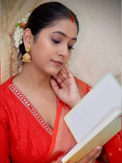 Another shot from the Nayanthara recreation. This look proves that a simple, well-draped saree and minimal accessories can be incredibly striking. Perfect for any festive occasion.