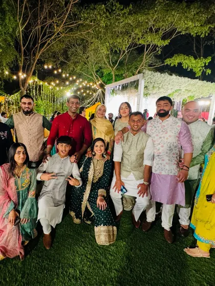 A wonderful group photo with the entire family after their sangeet performance at Palace Grounds. It's all about 'namma mane santhosha'.