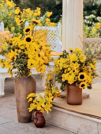 A close-up of the sunflower arrangements, showing their vibrant color and cheerful character.