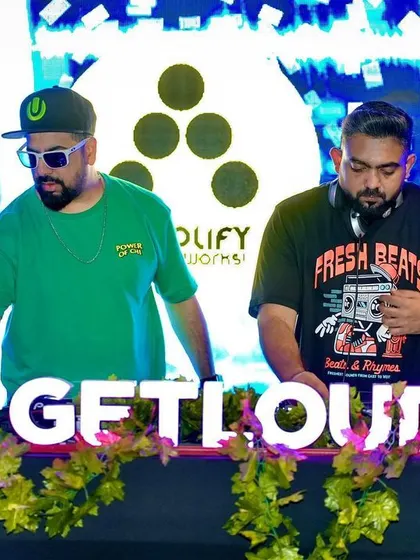 Teaming up with another DJ to get the crowd loud at our signature pool party.