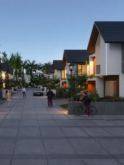 A visualization of a villa project in Ernakulam, showing a street of homes designed with a cohesive, modern-traditional architectural language.
