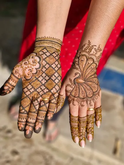 A unique design combining a peacock on one hand with a traditional checkerboard (jaal) pattern on the other.