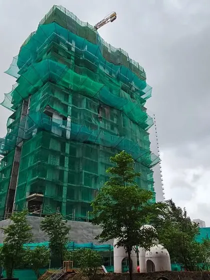 This image captures the Serein project under construction, with safety netting enveloping the structure. It demonstrates the scale of our residential developments and the progress towards creating a new urban community.