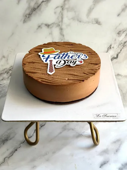 Introducing a new flavor for Father's Day, the Chocolate Dream Entremet. This cake is everything chocolate, with layers of rich mousse and a smooth finish, perfect for the chocolate-loving dad.