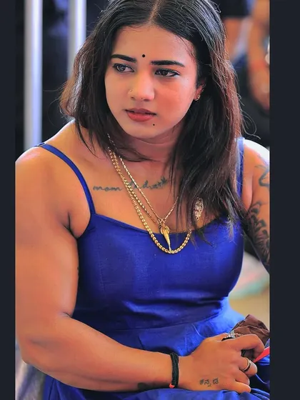 A candid shot, showing a moment of thought. Being a Kannadathi is a core part of my identity.