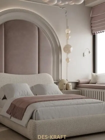 This elegant bedroom features a stunning arched headboard with plush upholstery, a cloud-like chandelier, and a cozy window seat, creating a dreamy and luxurious retreat.